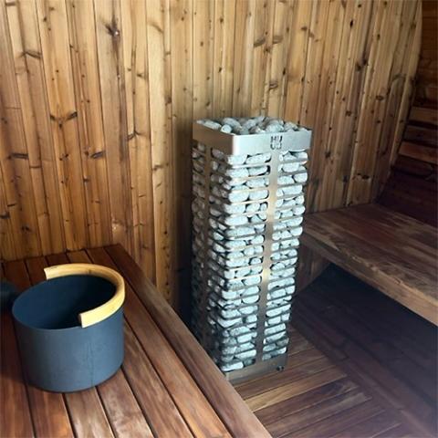 huum steel electric sauna heater in barrel sauna 